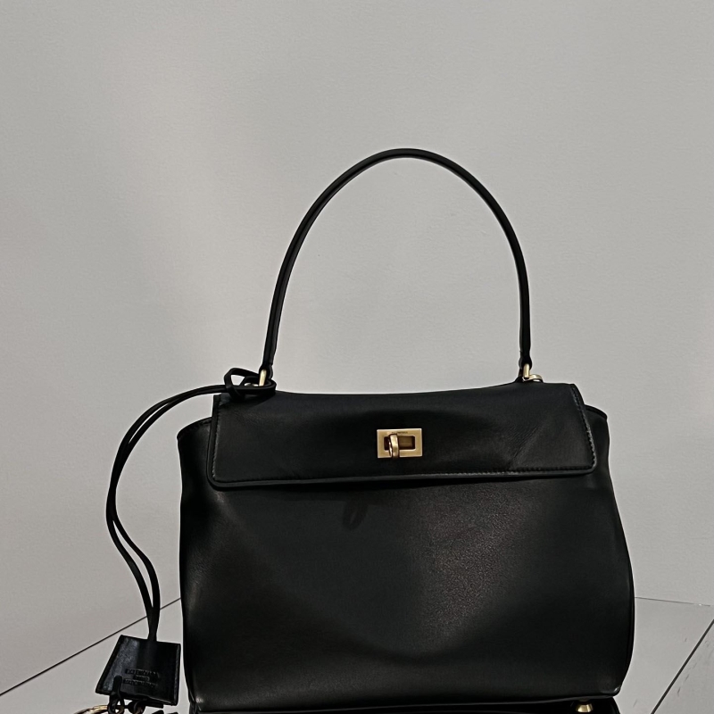 Ba*len*cia*ga top handle bags
